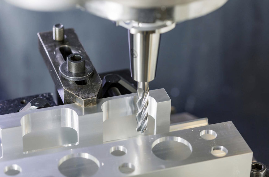 THE SPECIALLY DESIGNED PCD MILLING CUTTER MACHINES BOTH BORES WITH DIFFERENT DIAMETERS